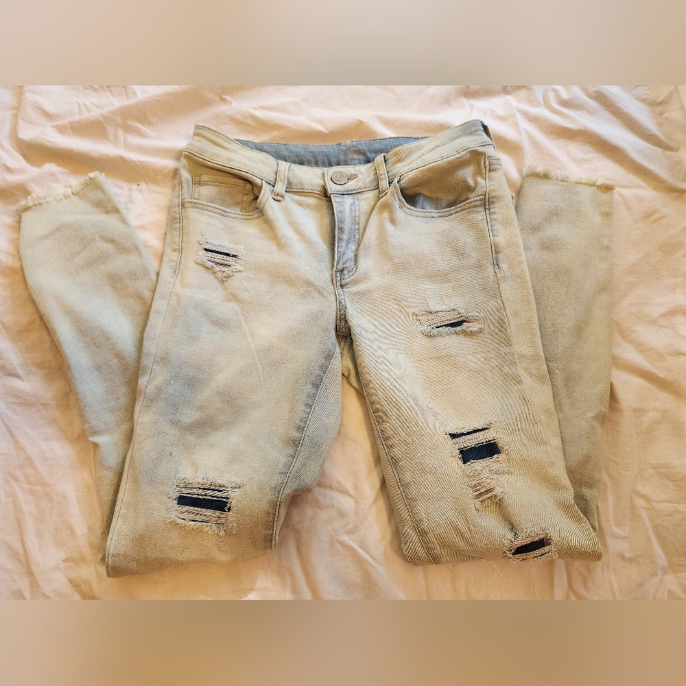 Acid washed Distressed low rise jeggings